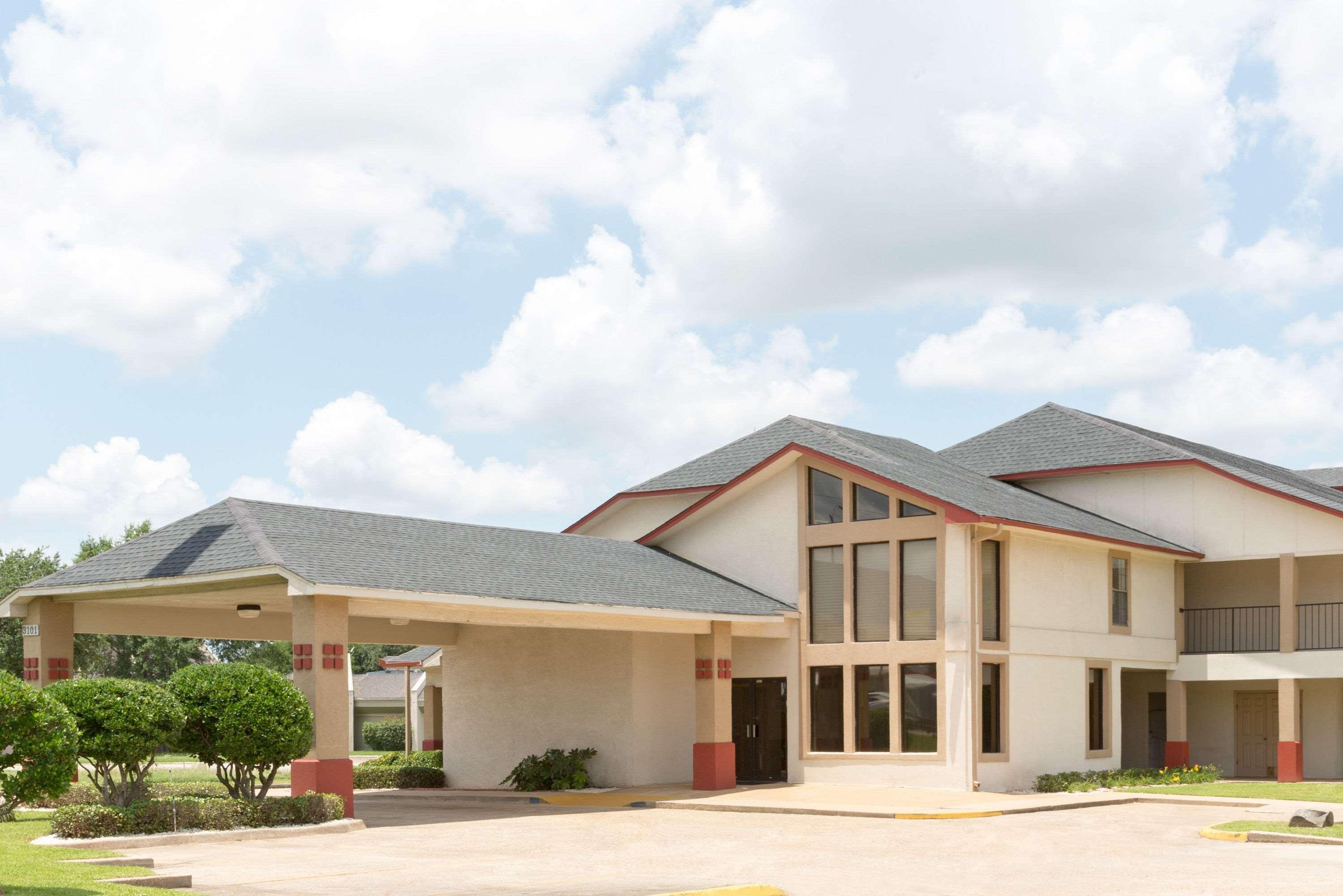 Super 8 By Wyndham Bossier City/Shreveport Area Bagian luar foto